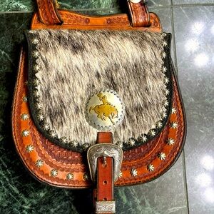 Vintage leather and cowhide Crossbody bag with silver embellishment